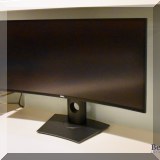 E03. Curved Dell computer monitor. 